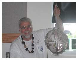 09 Curtis Ebbesmeyer with fish-float gift from Mary Canada.JPG